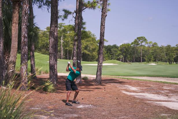 Tiger Woods shows you how to get out of jail with a big hook